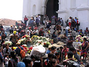 People selling flowers on the steps of the church in Chichicastenango.