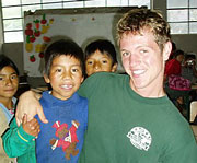 Volunteer with school children.